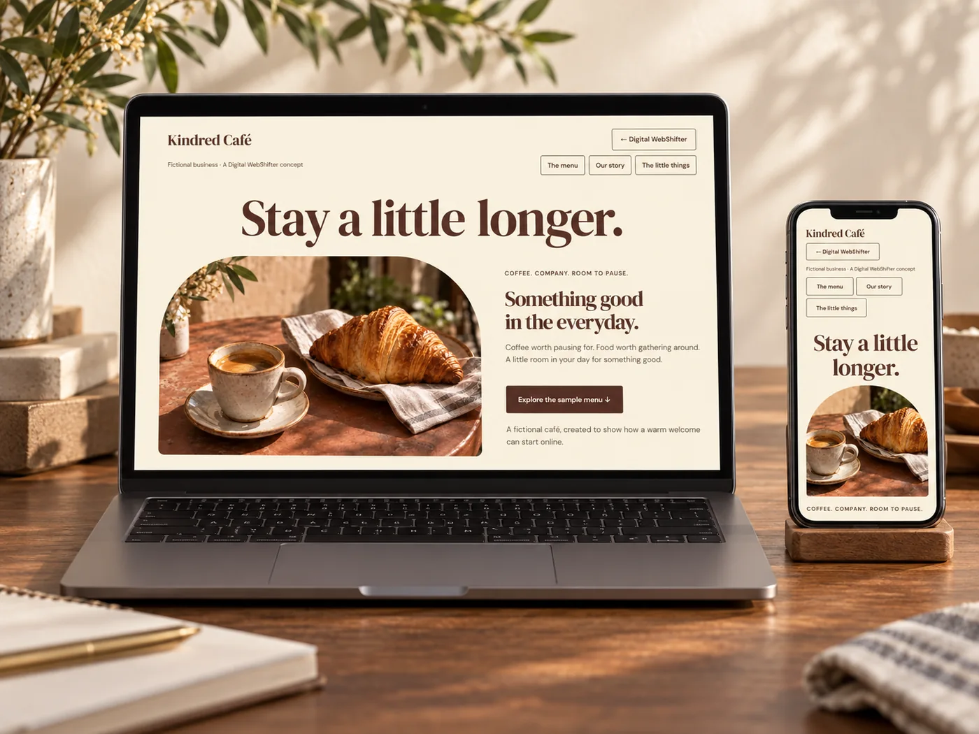 Illustrative laptop and phone displaying the fictional Kindred Cafe website concept.